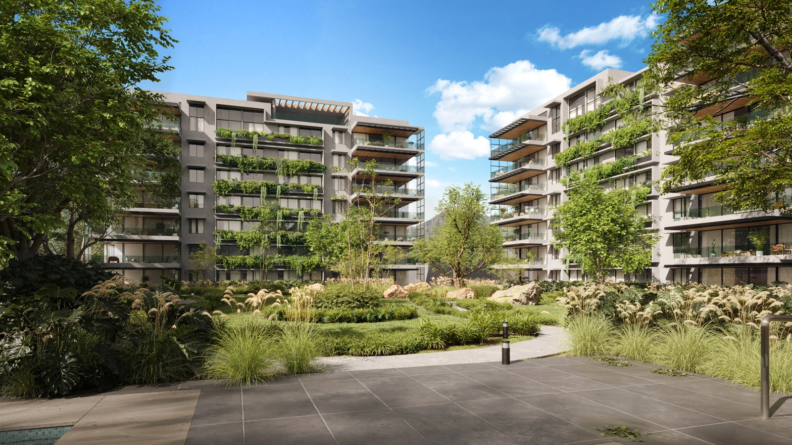 Attali Escazú residential buildings and landscaped courtyard
